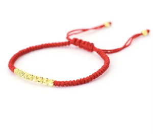 Tibetaanse gevlochten armband rood