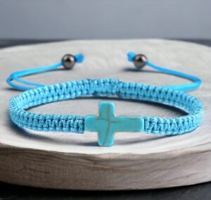 Blauwe armband met turkoois kruis