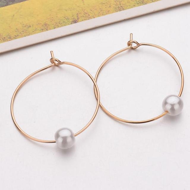 Goudkleurige Oorbel Ringen met Parel - Sieraden - Spiritueelboek.nl