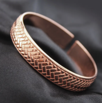 Koper armband gevlochten